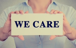 WE CARE sign